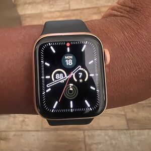 Apple Watch SE GPS, 40mm “Rose” Gold Aluminum Case with Black Sport Band